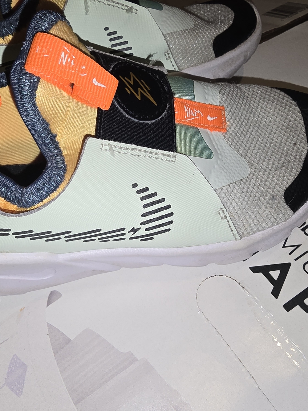 Nike Kids Slip-On Sneakers in Mint, Orange and Black